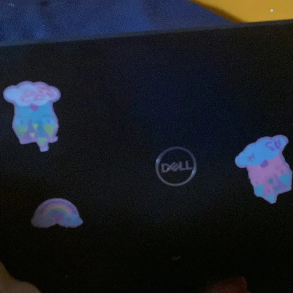 This computer works perfectly fine I can take the stickers off if so